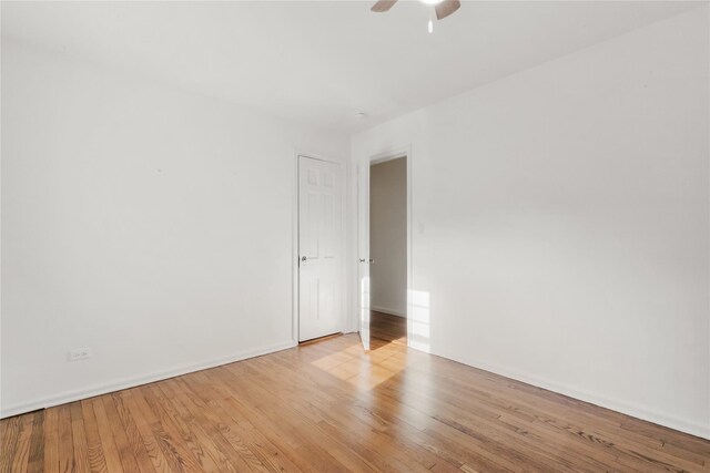 unfurnished room featuring ceiling fan and light hardwood / wood-style floors