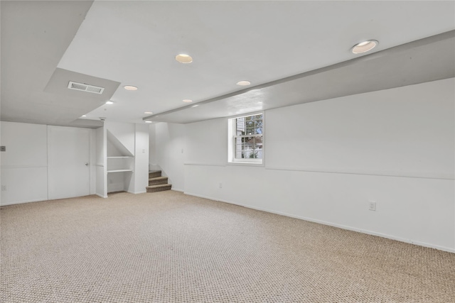 basement with light carpet