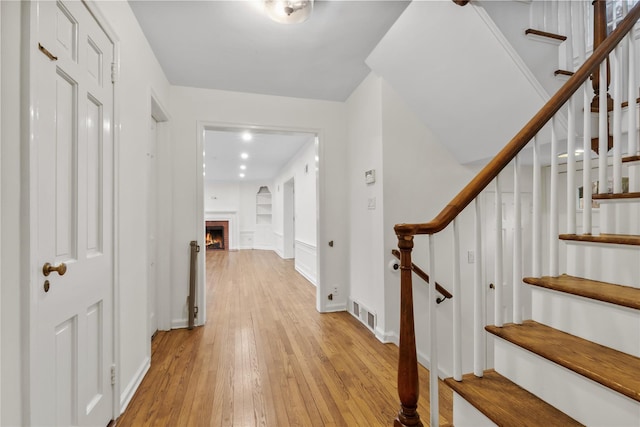 hallway featuring light hardwood / wood-style floors