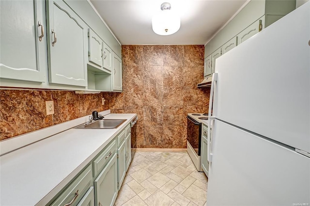 kitchen featuring green cabinets, white appliances, and sink