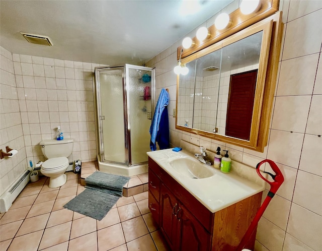 bathroom featuring walk in shower, tile patterned floors, tile walls, and a baseboard heating unit