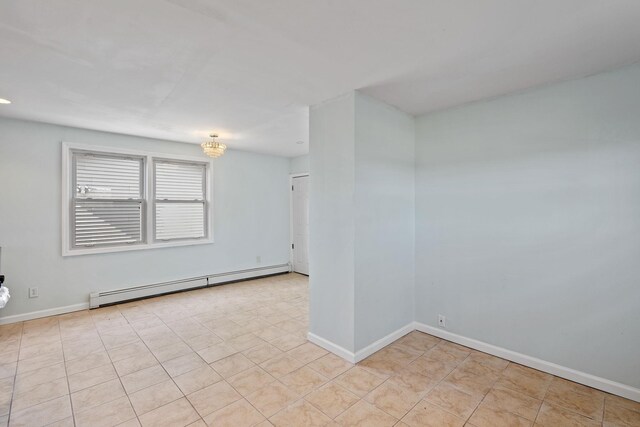 29 Thompson St, Port Jervis, NY 12771 - spare room featuring an inviting chandelier, baseboards, and baseboard heating