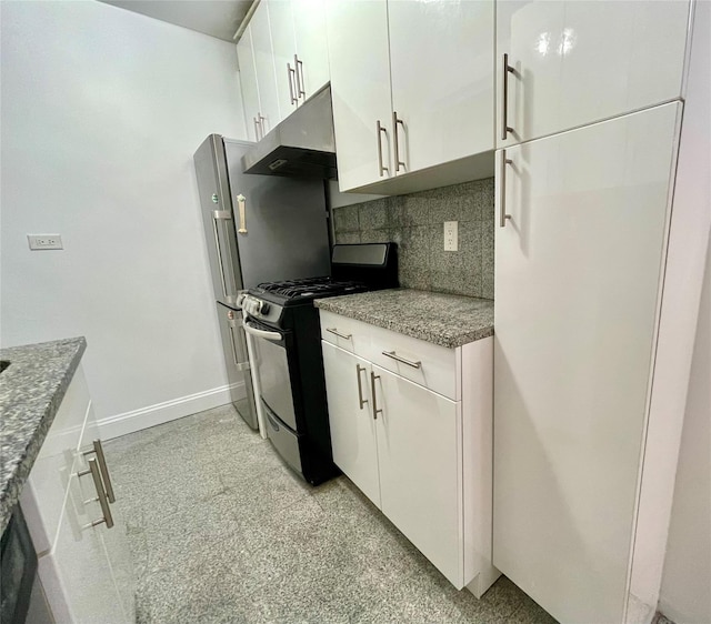 kitchen featuring tasteful backsplash, gas range, white cabinetry, and light stone counters