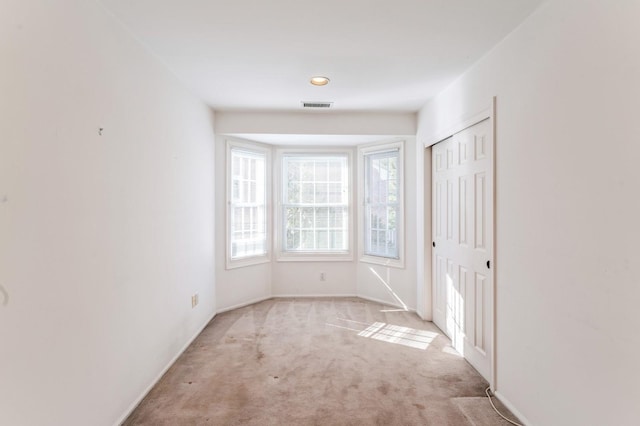 79 Marjorie Ct, Manhasset, NY 11030 - entrance foyer featuring carpet and baseboards