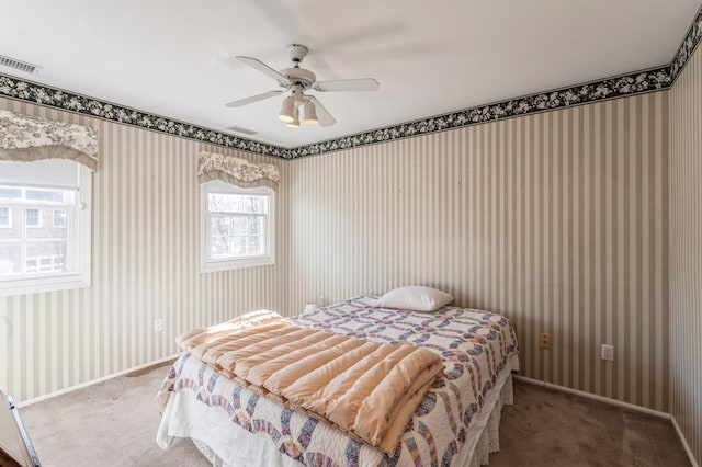 79 Marjorie Ct, Manhasset, NY 11030 - bedroom featuring carpet, wallpapered walls, and ceiling fan