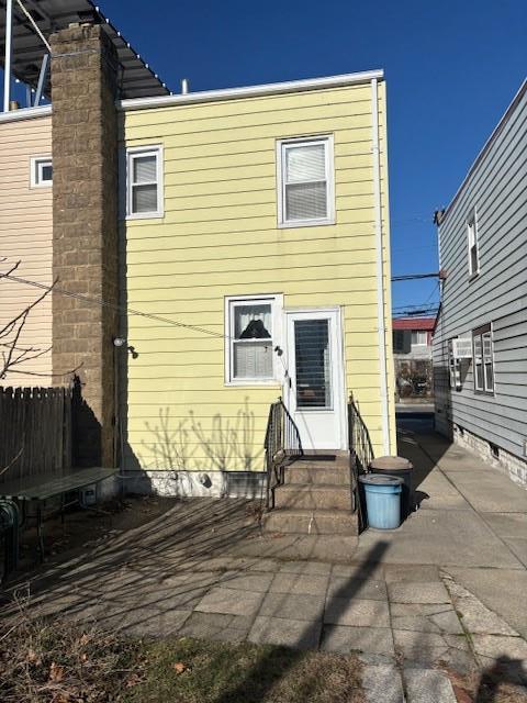 rear view of property with a patio area