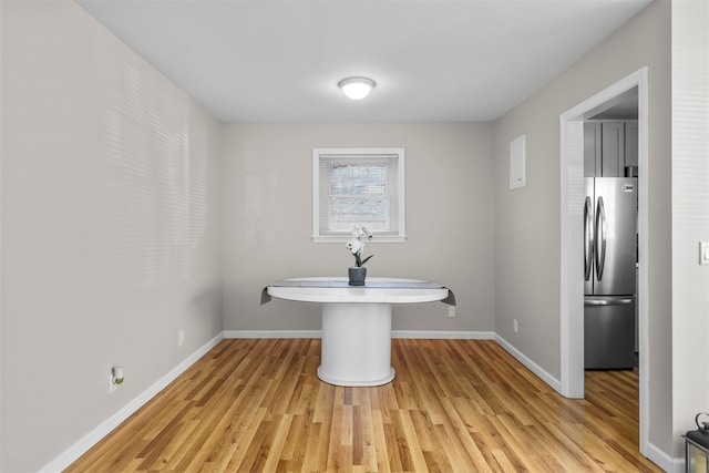 bathroom with hardwood / wood-style flooring