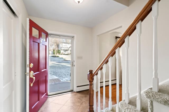 foyer featuring light tile patterned floors