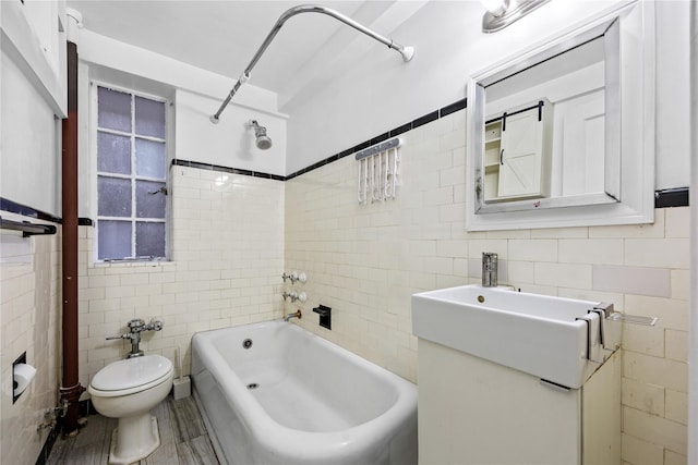 full bathroom with vanity, tiled shower / bath combo, tile walls, and toilet