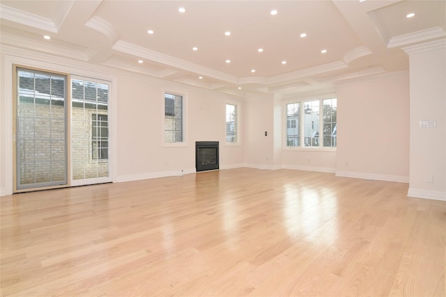 unfurnished living room featuring ornamental molding, light hardwood / wood-style floors, and beamed ceiling