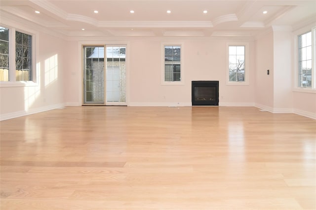 unfurnished living room featuring coffered ceiling, beam ceiling, and light wood-type flooring