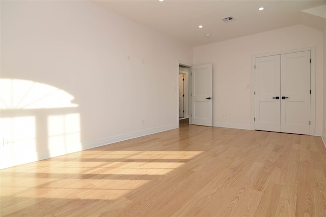 unfurnished bedroom featuring light wood-type flooring