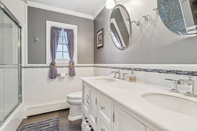 full bathroom featuring tile patterned floors, ornamental molding, tile walls, and a baseboard heating unit