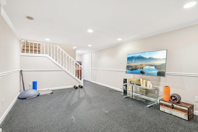 workout room with ornamental molding