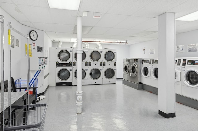 laundry area featuring stacked washer and clothes dryer and independent washer and dryer