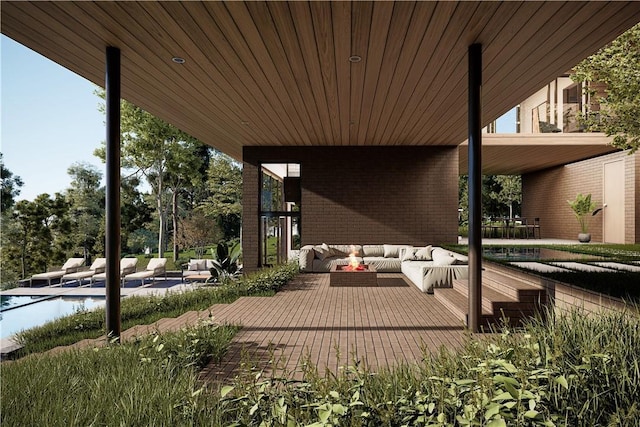 view of patio / terrace with outdoor lounge area and a pool