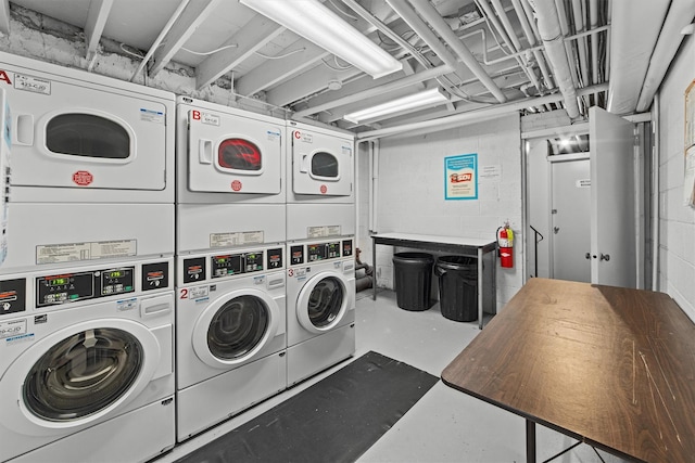 laundry area featuring independent washer and dryer and stacked washer and clothes dryer