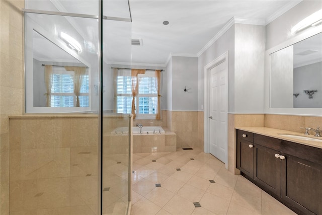 bathroom with plus walk in shower, vanity, tile patterned floors, and crown molding