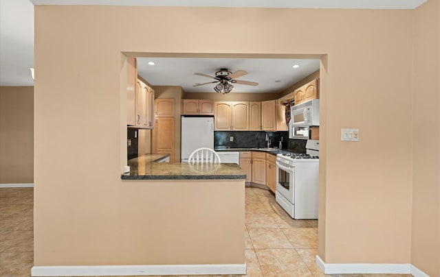 kitchen featuring white appliances, backsplash, ceiling fan, light brown cabinetry, and light tile patterned flooring