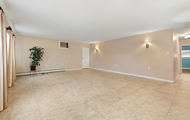 spare room featuring a baseboard radiator and light tile patterned floors