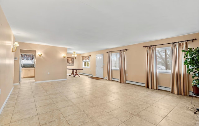 spare room featuring pool table, ceiling fan, a baseboard heating unit, and light tile patterned floors