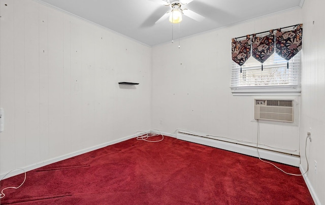 spare room featuring ceiling fan, carpet floors, a wall unit AC, baseboard heating, and crown molding