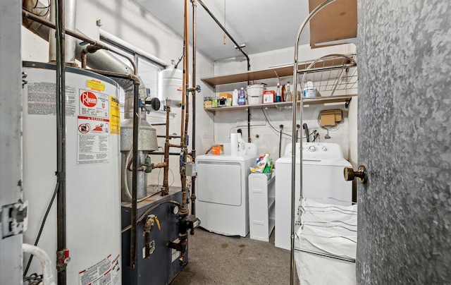 utility room featuring gas water heater and independent washer and dryer