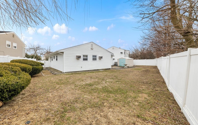 rear view of property featuring a yard