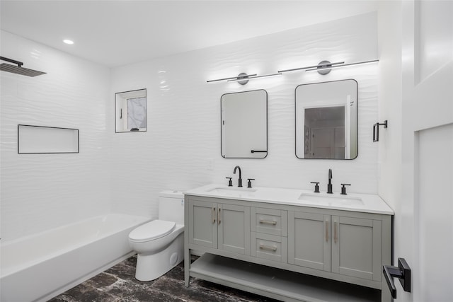 full bathroom with bathtub / shower combination, vanity, and toilet