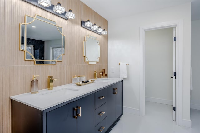 bathroom with concrete flooring and vanity