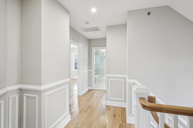 hallway with light wood-type flooring