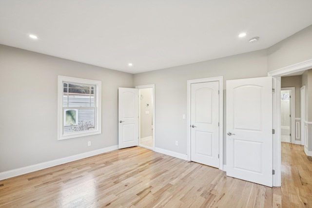 unfurnished bedroom with light hardwood / wood-style floors