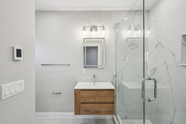 bathroom featuring vanity and an enclosed shower