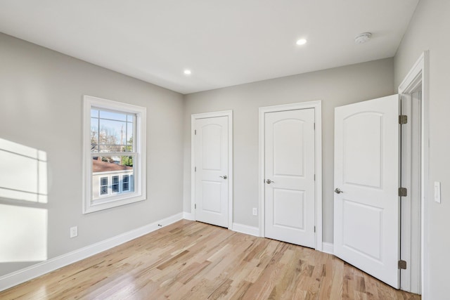 unfurnished bedroom featuring light hardwood / wood-style floors