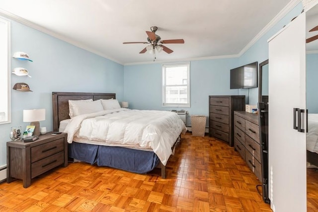 bedroom with ceiling fan, crown molding, and light parquet floors