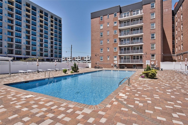 view of pool featuring a patio area