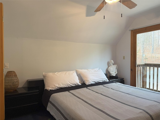 bedroom featuring ceiling fan and lofted ceiling