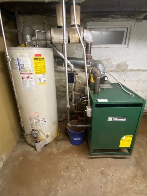 utility room featuring gas water heater