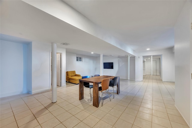 rec room featuring light tile patterned flooring