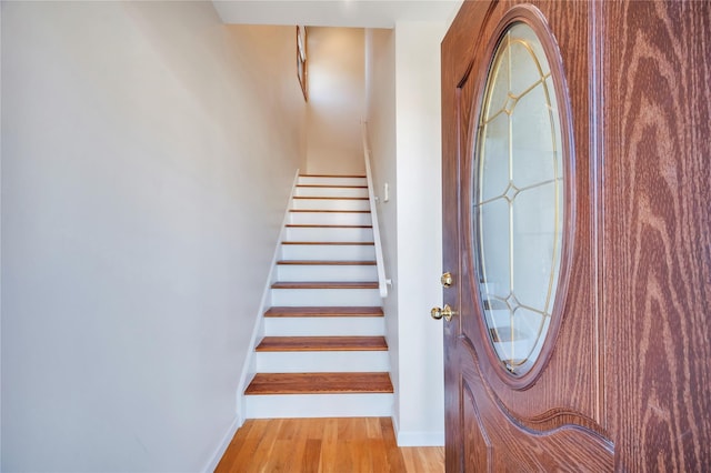 stairway with wood-type flooring