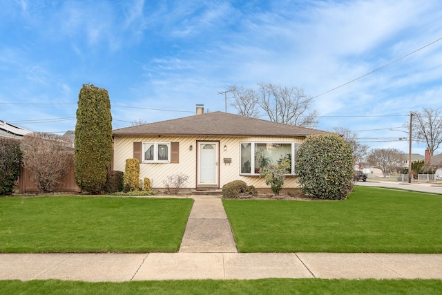 view of front of home with a front yard