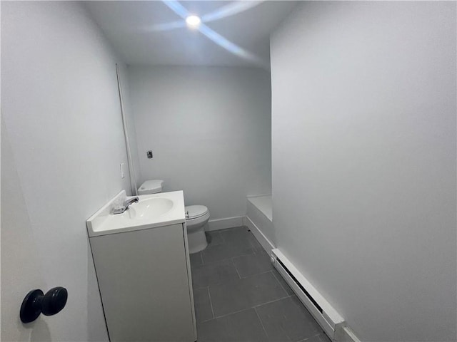 bathroom featuring a baseboard radiator, toilet, tile patterned floors, and vanity