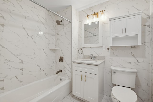 full bathroom featuring toilet, vanity, and tiled shower / bath