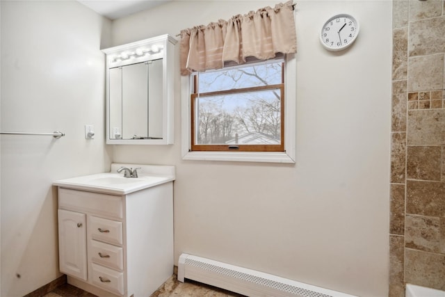 bathroom featuring vanity and a baseboard radiator