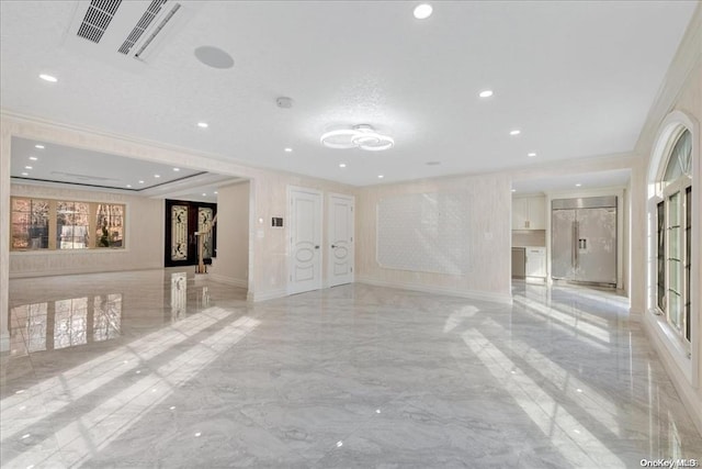 interior space featuring ornamental molding and french doors