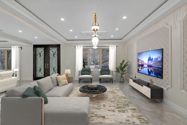 living room with crown molding and french doors