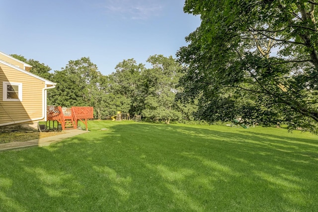 view of yard featuring a deck