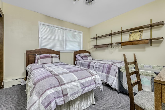 carpeted bedroom featuring a baseboard radiator