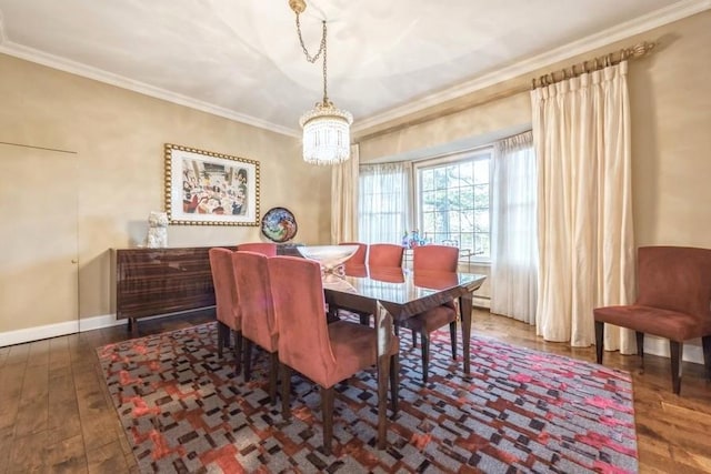 dining space featuring an inviting chandelier, crown molding, and dark wood-type flooring