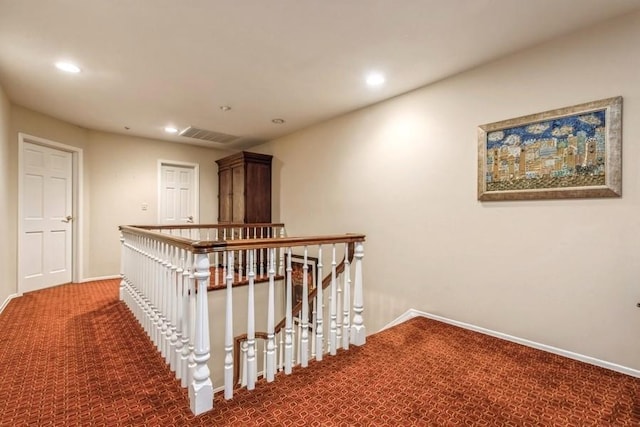 corridor featuring carpet flooring